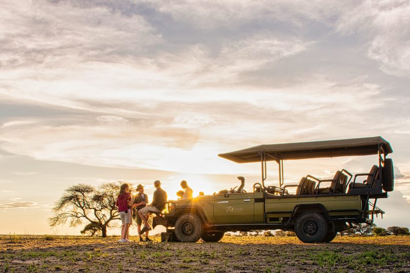 Sundowners before your night game drive.