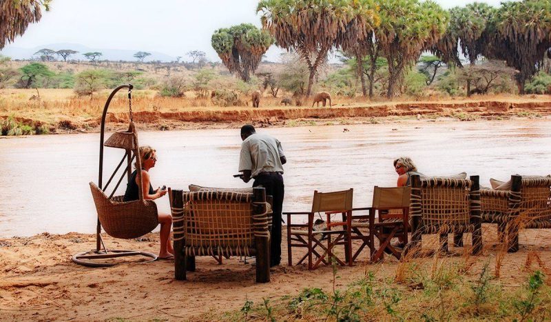 Lounge by the river at Elephant Bedroom Camp