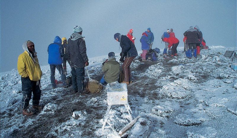 Climbing to the top of Mt. Kilimanjaro.